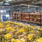Modern US domestic ecommerce dropshipping fulfillment warehouse with packages ready for fast 2-3 day delivery
