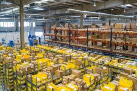 Modern US domestic ecommerce dropshipping fulfillment warehouse with packages ready for fast 2-3 day delivery