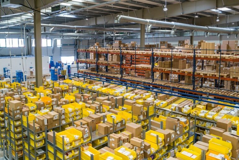 Modern US domestic ecommerce dropshipping fulfillment warehouse with packages ready for fast 2-3 day delivery